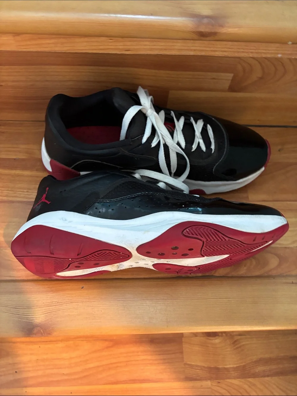 Jordan Men's Black Sneakers with White Laces and Red Accents